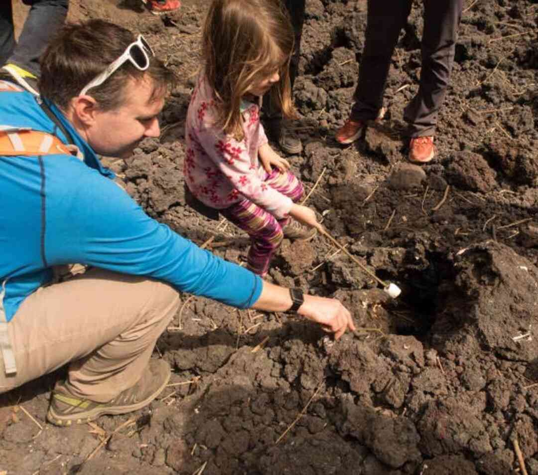 Pacaya Volcano tour in Guatemala featuring Roasting Marshmallow over thermal vents
